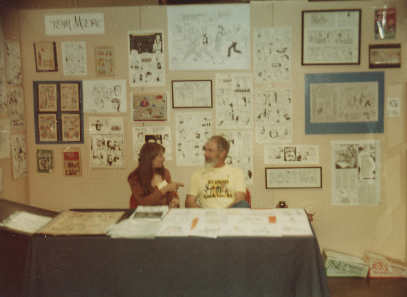 Ann James Massey visiting her uncle Tom Moore's booth at a comic convention in the late 70's