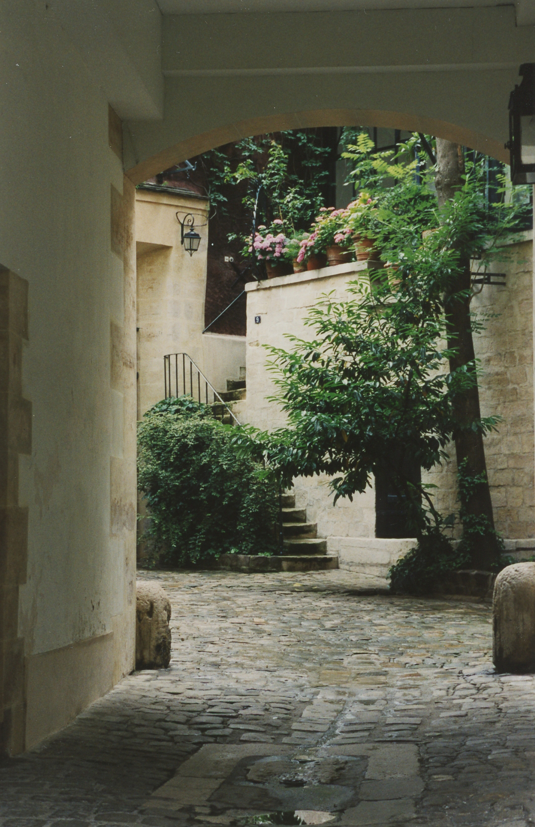 Cour de Rohan, a series of three charming interconnecting courtyards originating in the 16th century (this building's exterior view was used for Gigi's apartment in the movie).Photo © 1998 Ann James Massey
