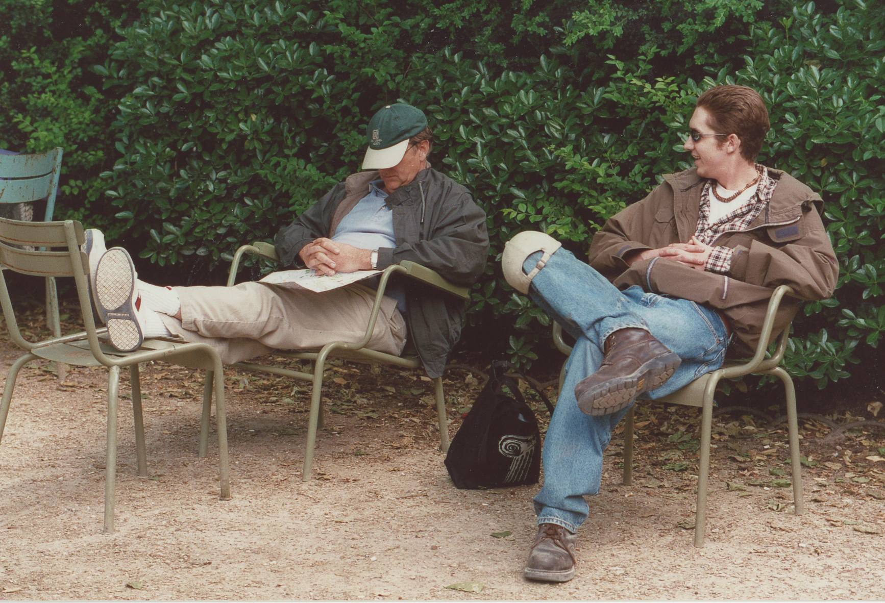 Frank James and his son Paul in the Luxembourg Gardens / walking everywhere takes it's toll.
Photo ©2001 Ann James Massey