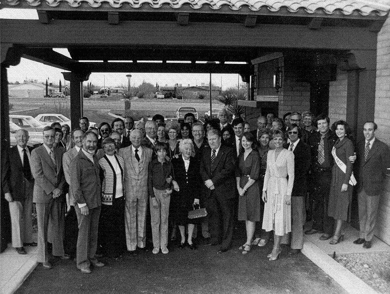 Opening of the Paul O. Moore branch of Mutual Savings and Loan in 1981. Ann James Massey's grandfather is the third from the left on the front row.